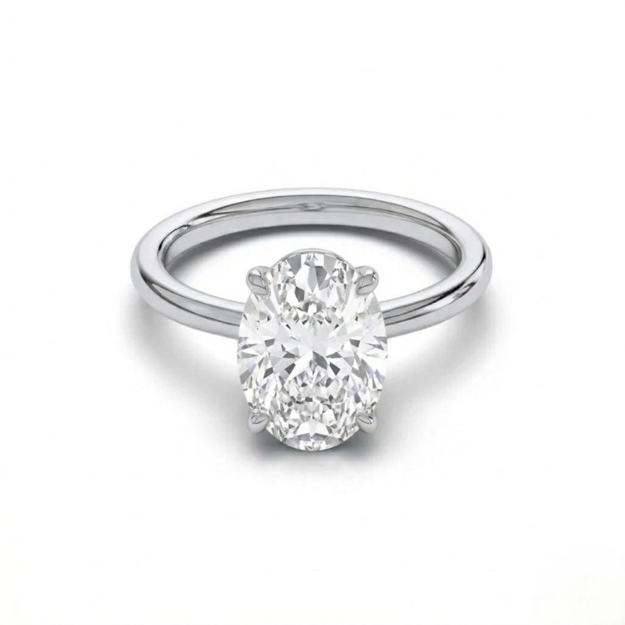 Oval-Cut Diamond Solitaire Ring – Minimalist Prong Setting