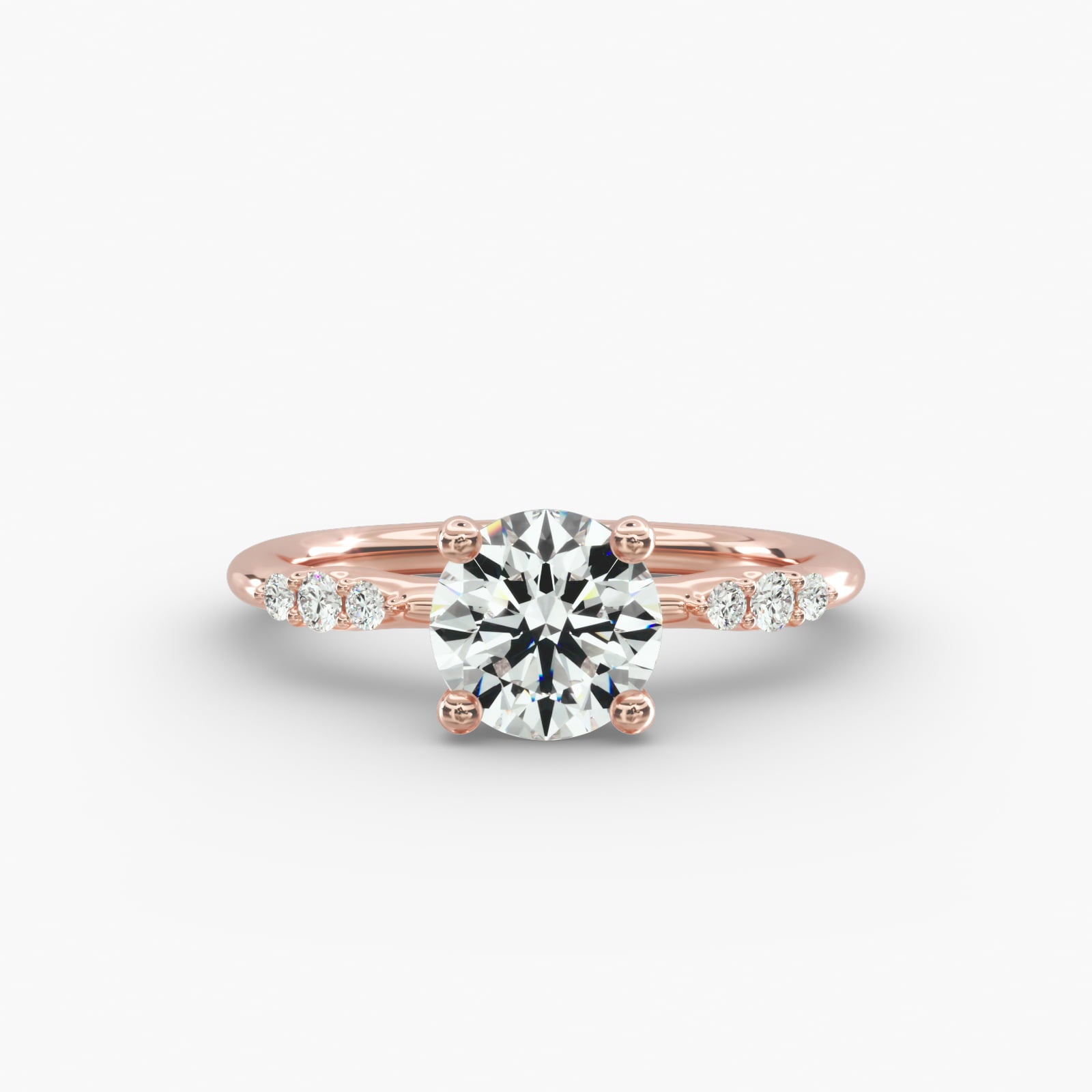 Graduated Sparkle Round Lab Grown Diamond Center Engagement Ring