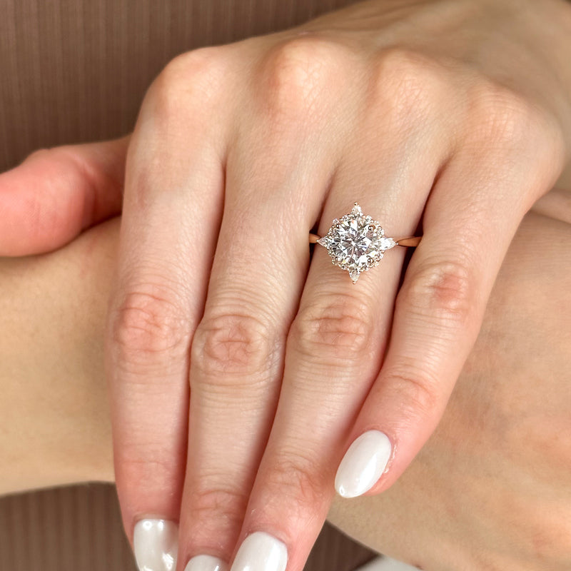 Halo-style with Pear Accents and Round Lab Grown Diamond Center Engagement Ring
