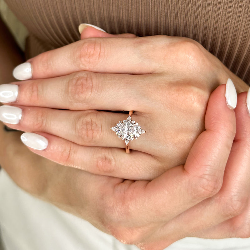 Halo-style with Pear Accents and Oval Lab Grown Diamond Center Engagement Ring