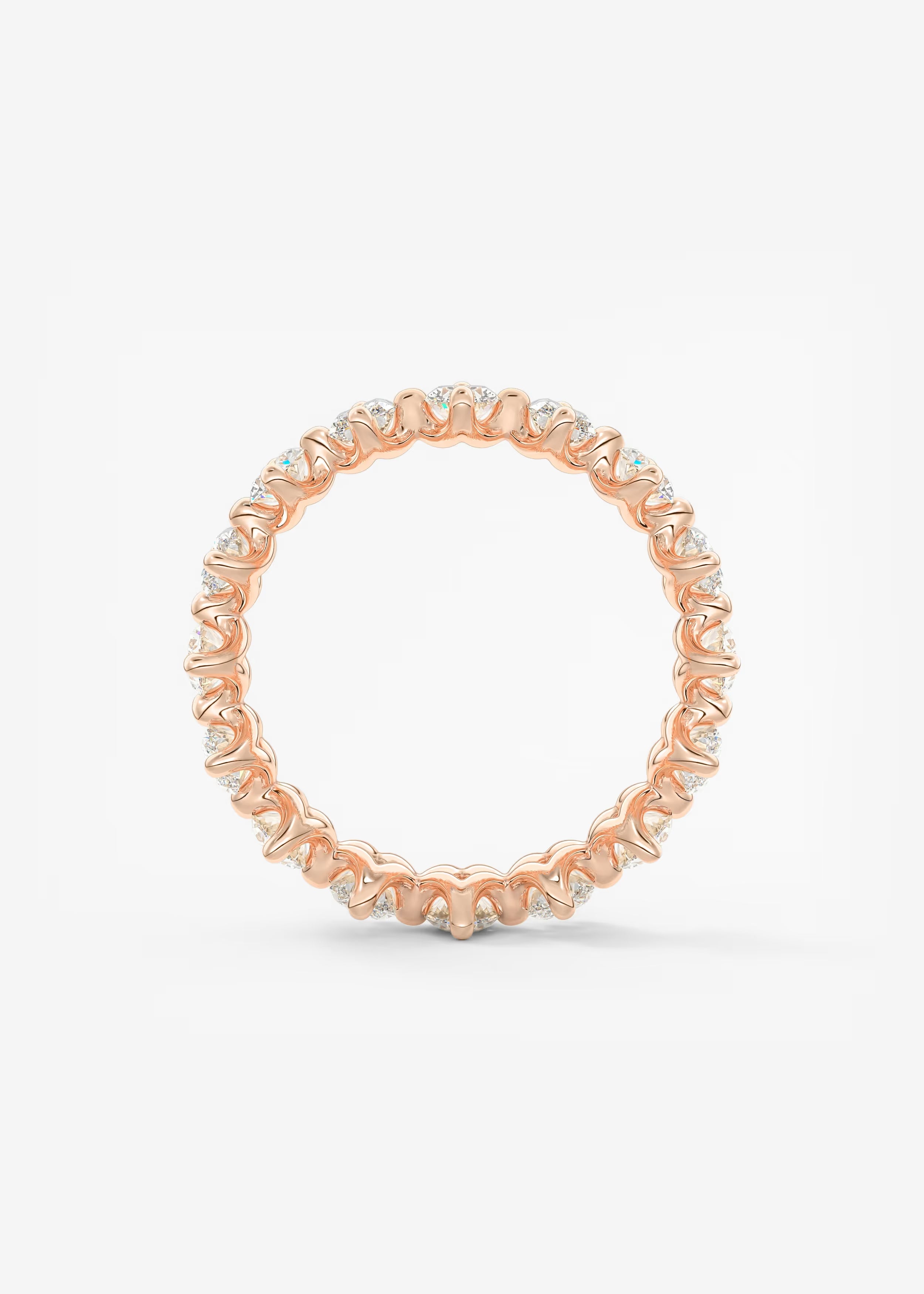 Gold Oval‑Cut Lab Diamond Eternity Band with Intricate Prong Detailing
