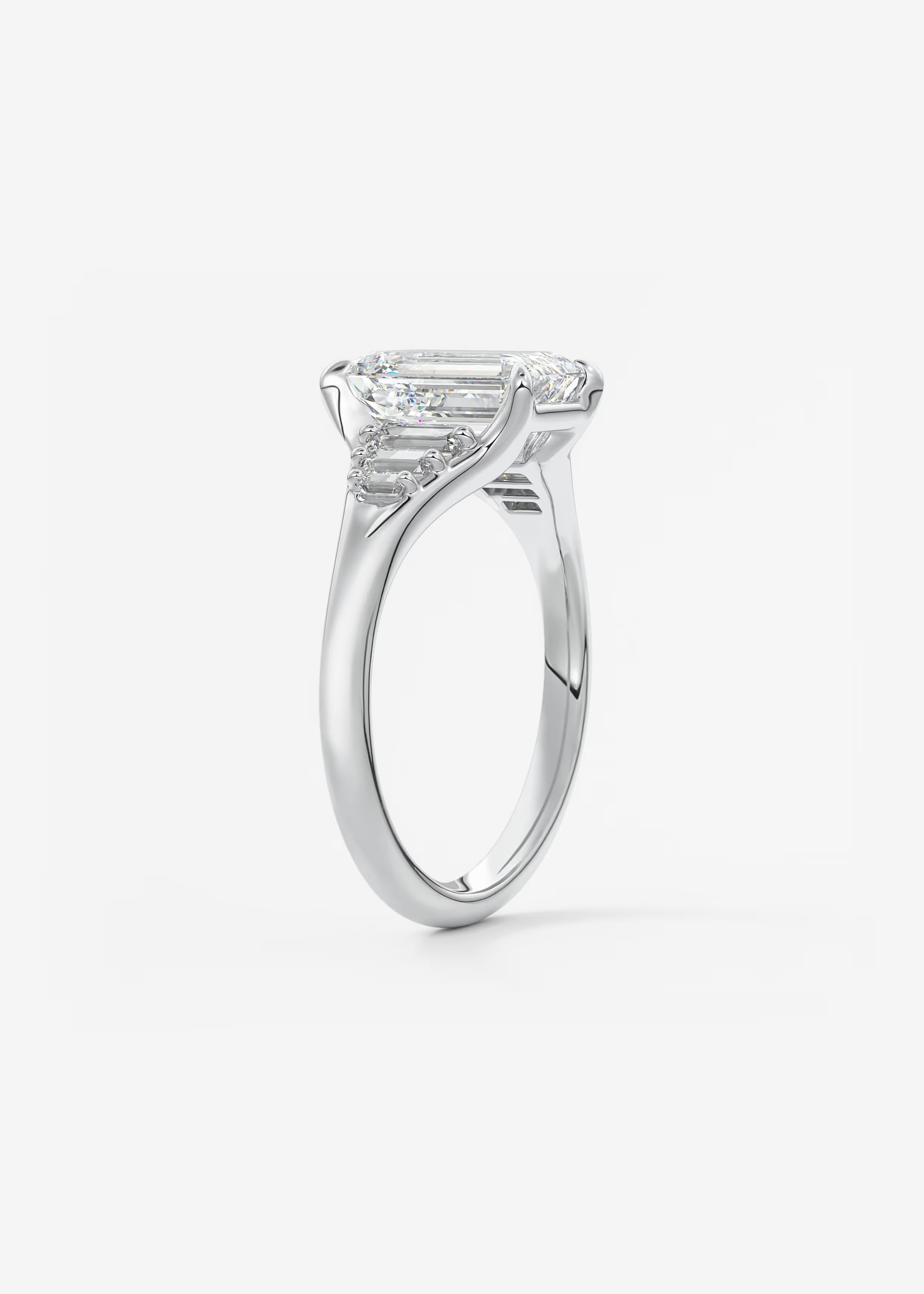 Emerald & Baguette Three Stone Split Shank Engagement Ring