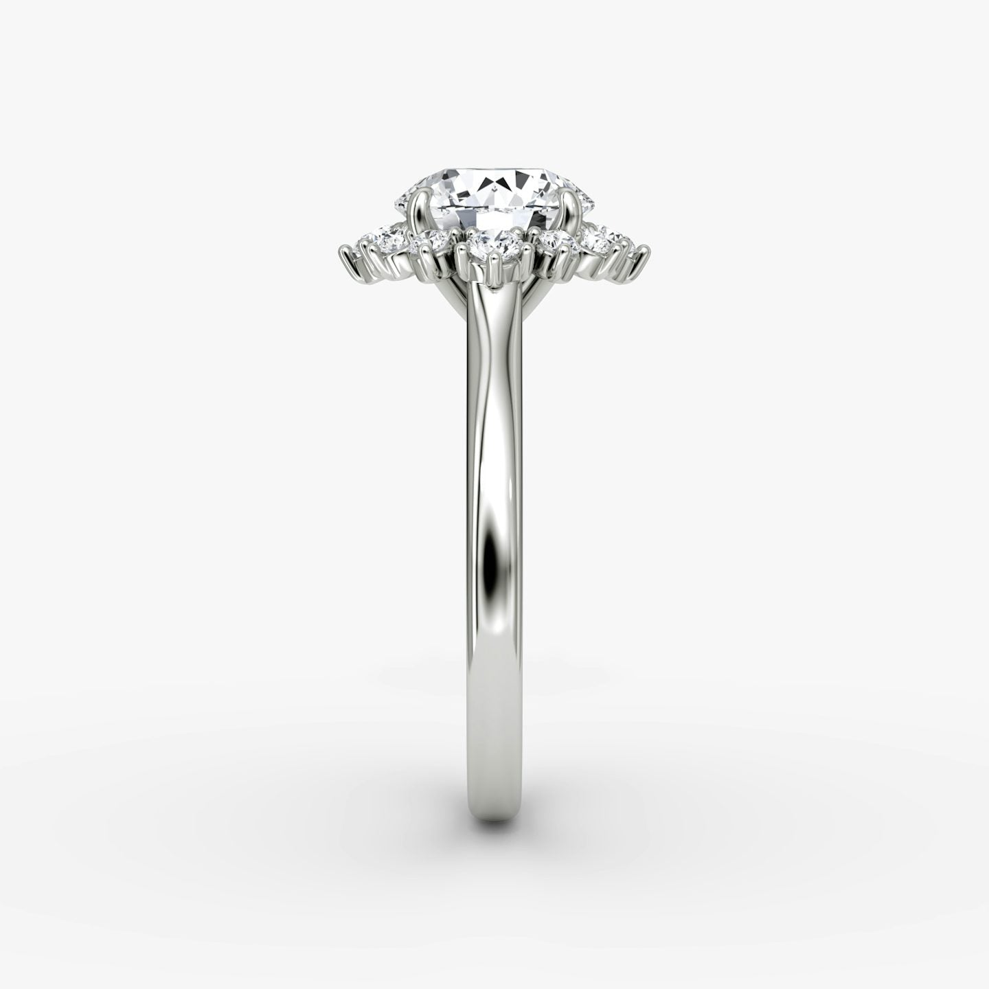 The Aurora Halo Round Brilliant Engagement Ring