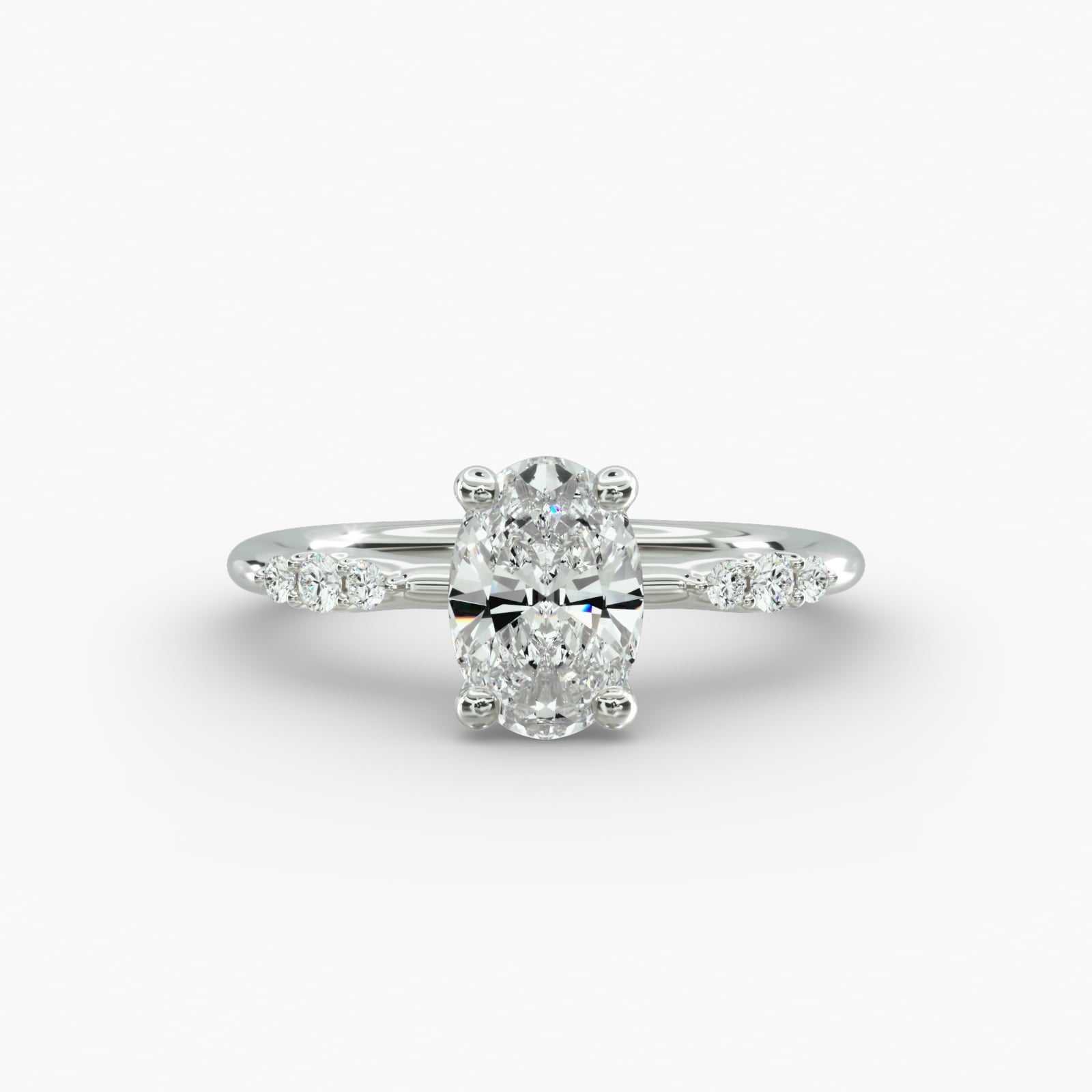 Graduated Sparkle Oval Lab Grown Diamond Center Engagement Ring