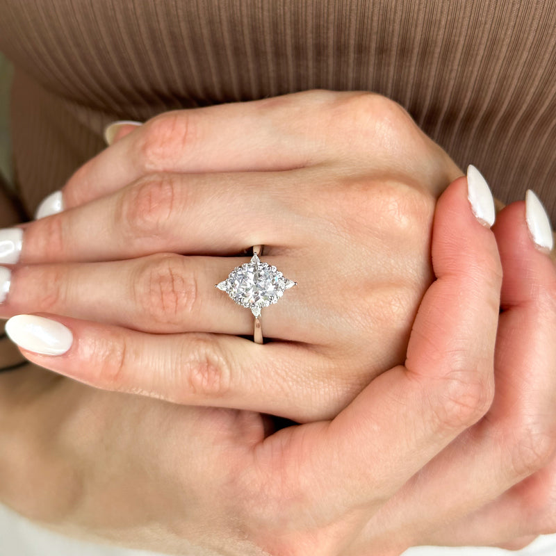 Halo-style with Pear Accents and Oval Lab Grown Diamond Center Engagement Ring