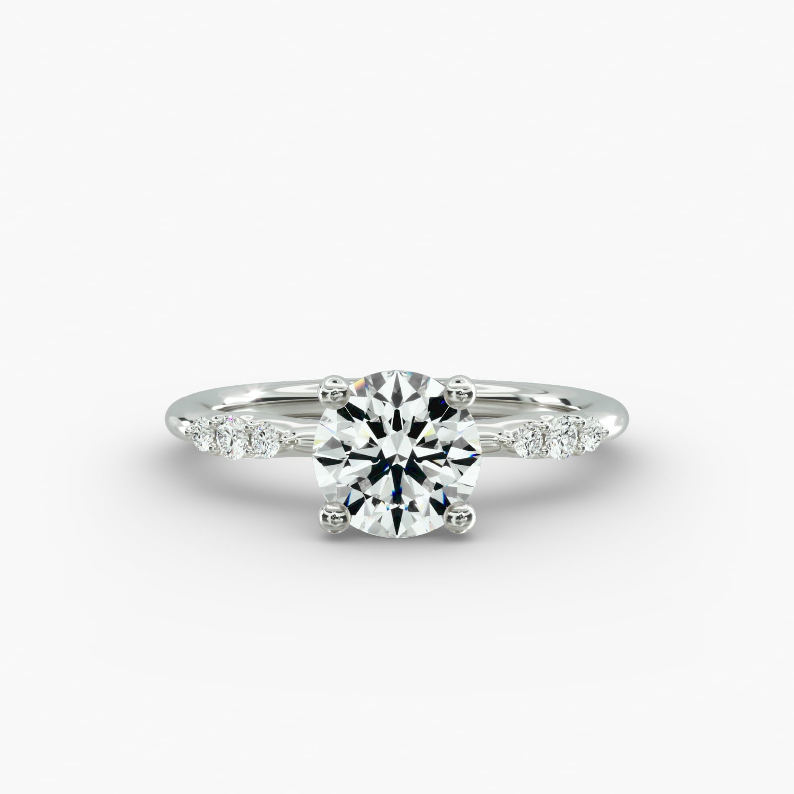 Graduated Sparkle Round Lab Grown Diamond Center Engagement Ring