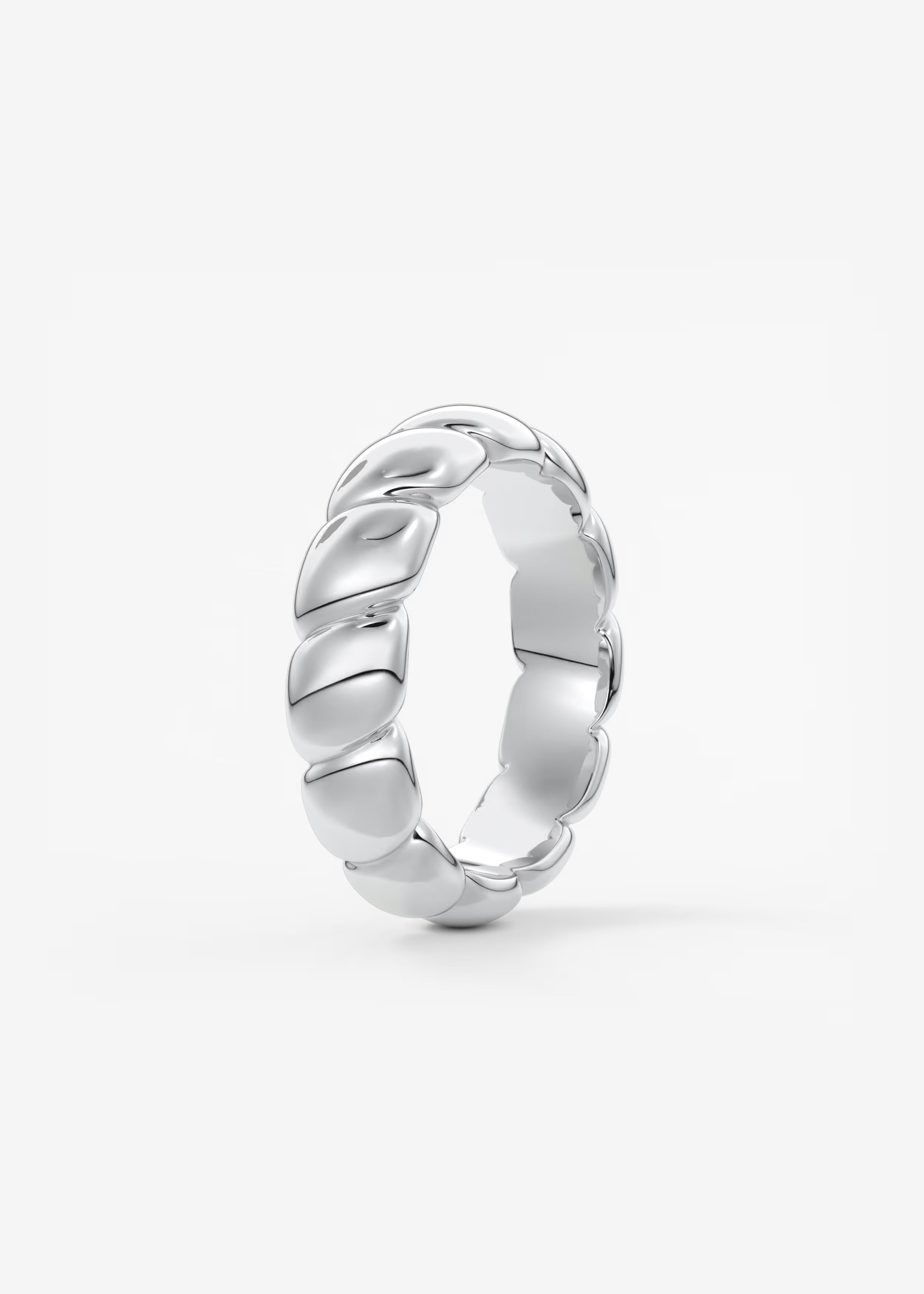 Gold Sculptural Band with Overlapping Leaf‑Inspired Design