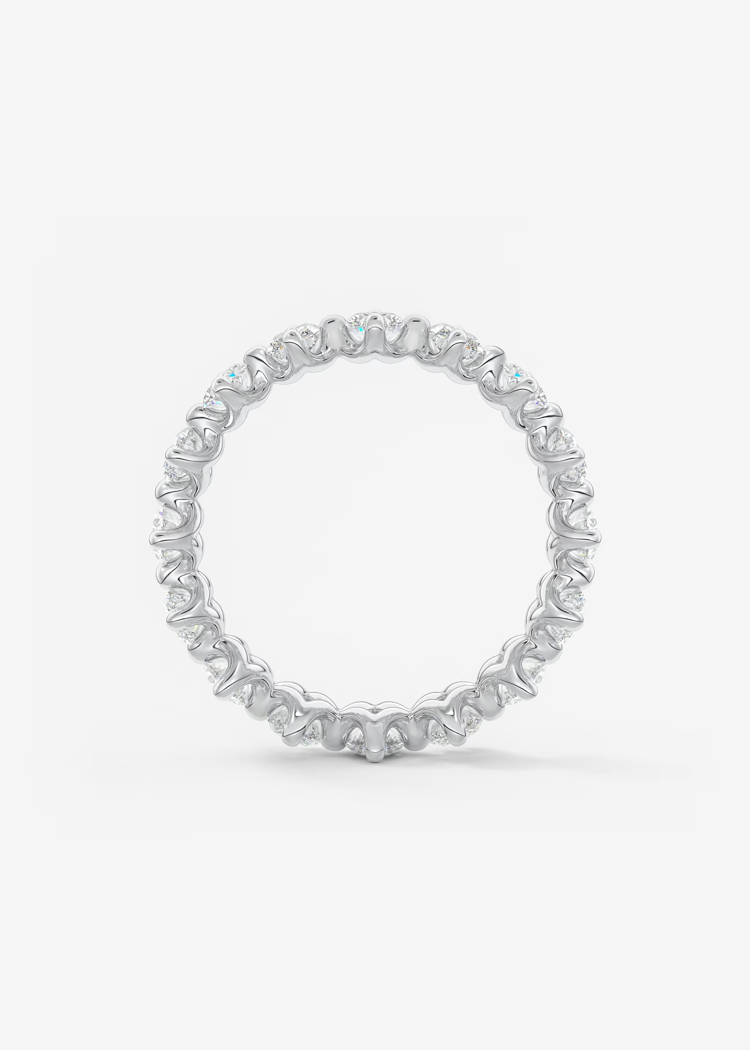 Gold Oval‑Cut Lab Diamond Eternity Band with Intricate Prong Detailing