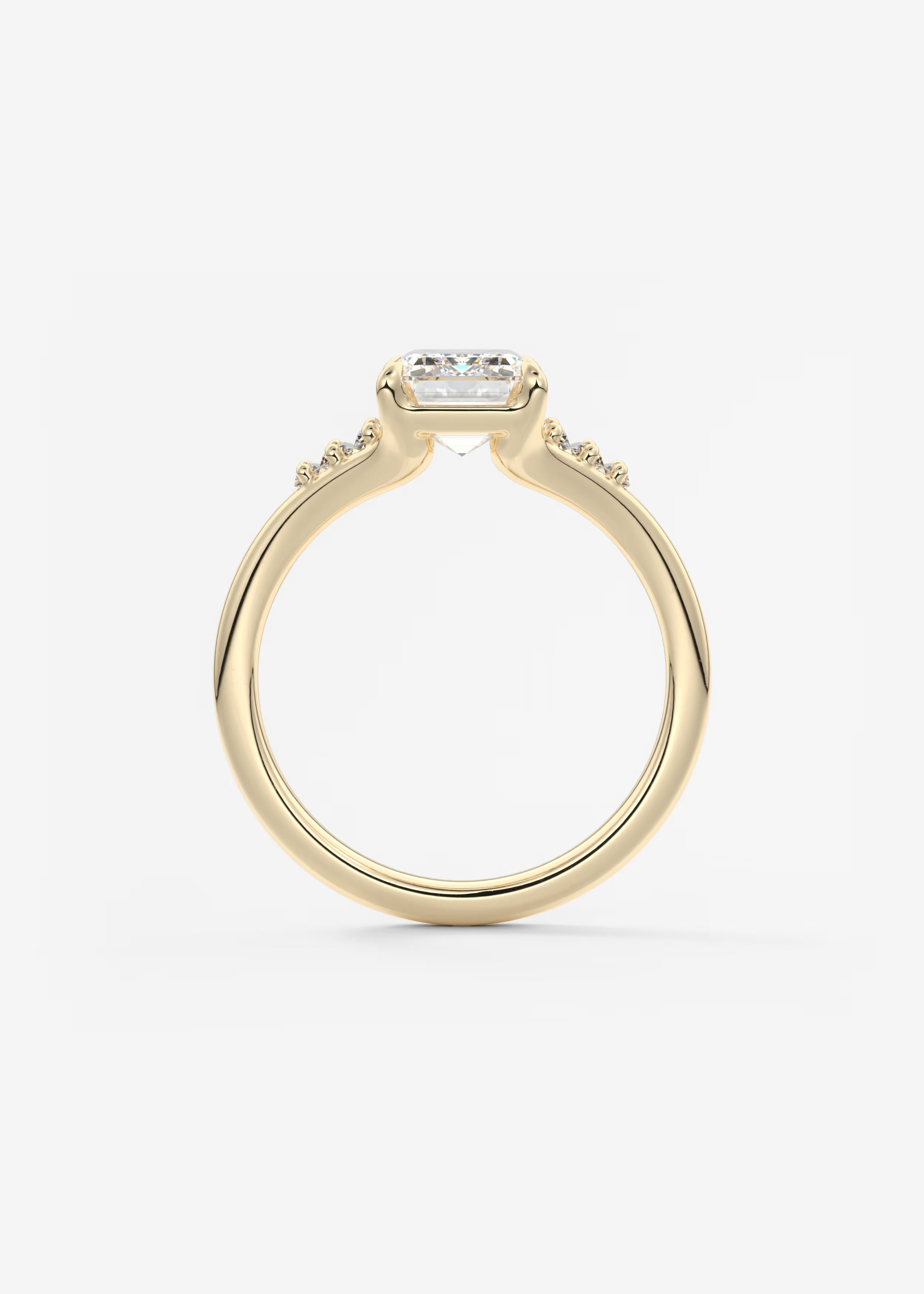 Emerald & Baguette Three Stone Split Shank Engagement Ring