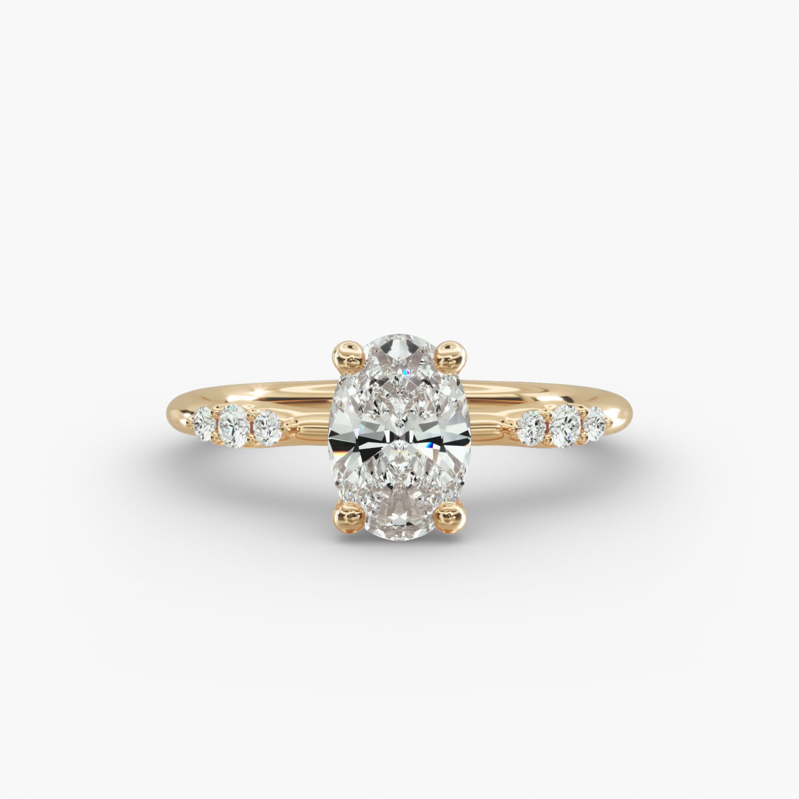 Graduated Sparkle Oval Lab Grown Diamond Center Engagement Ring