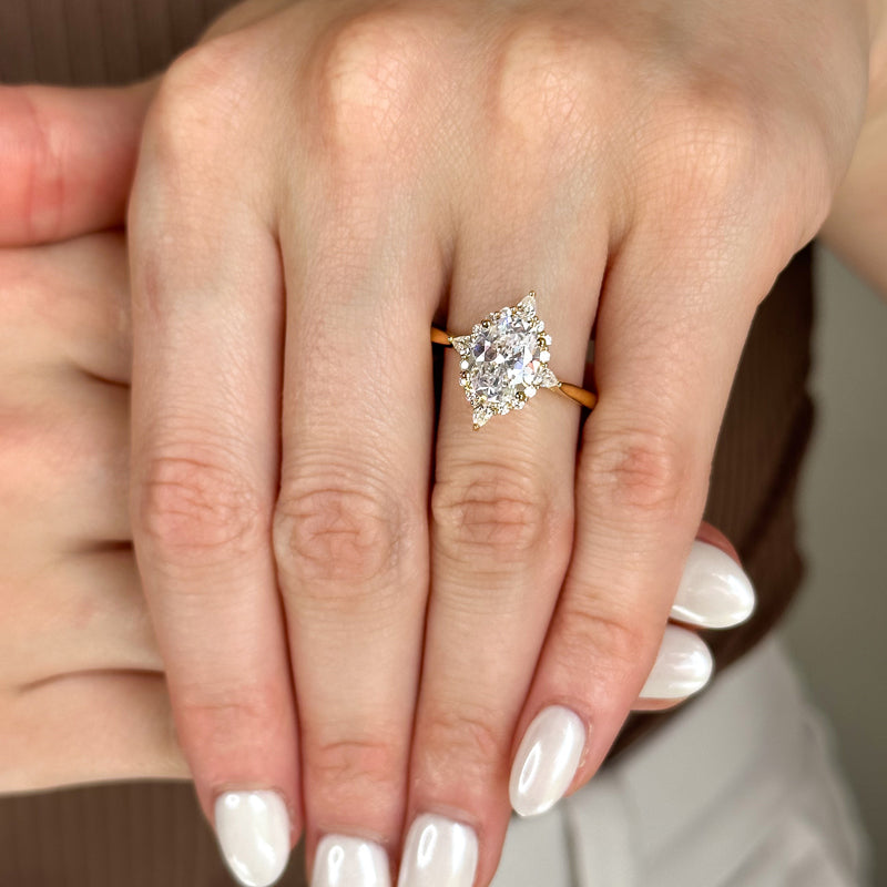 Halo-style with Pear Accents and Oval Lab Grown Diamond Center Engagement Ring