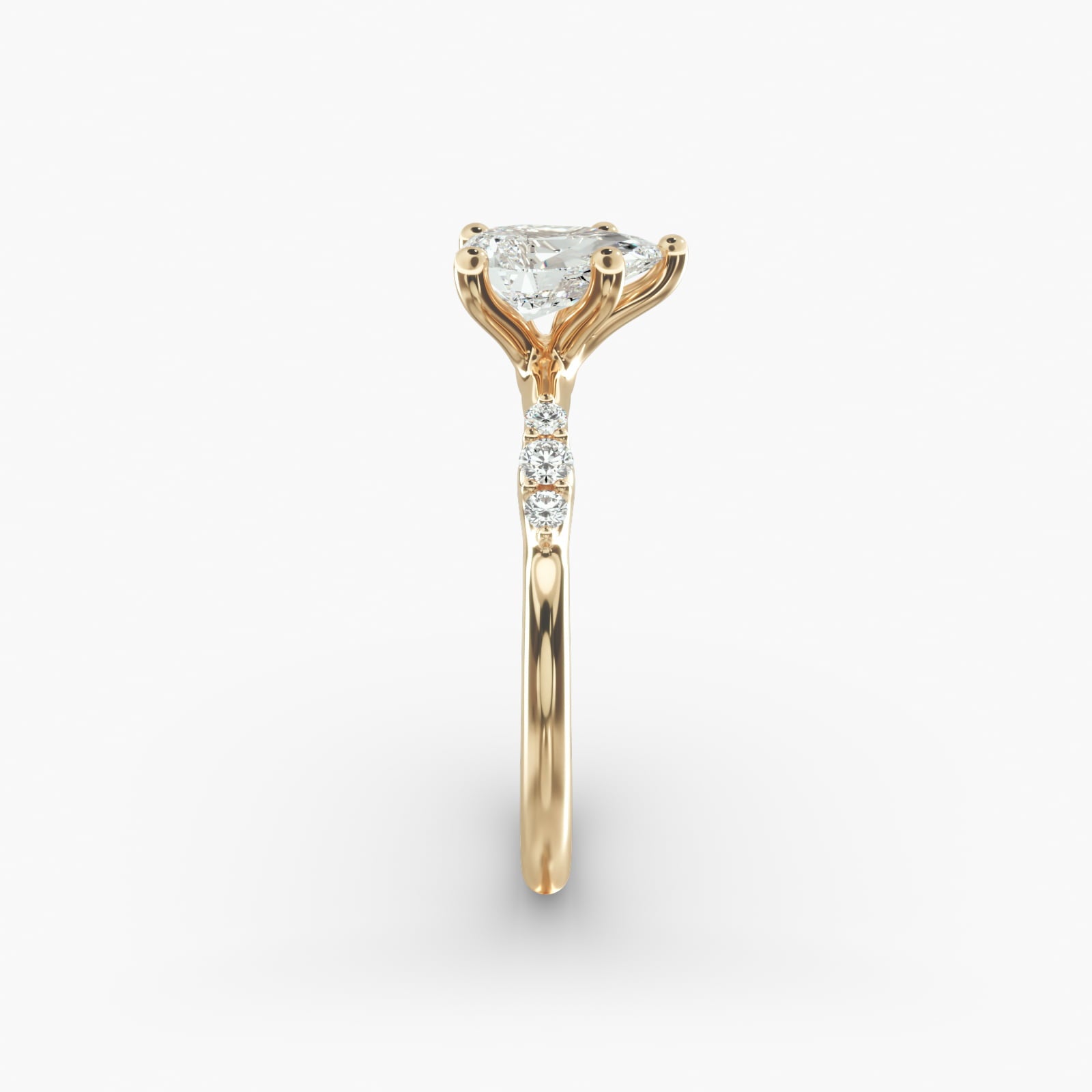 Graduated Sparkle Pear Lab Grown Diamond Center Engagement Ring